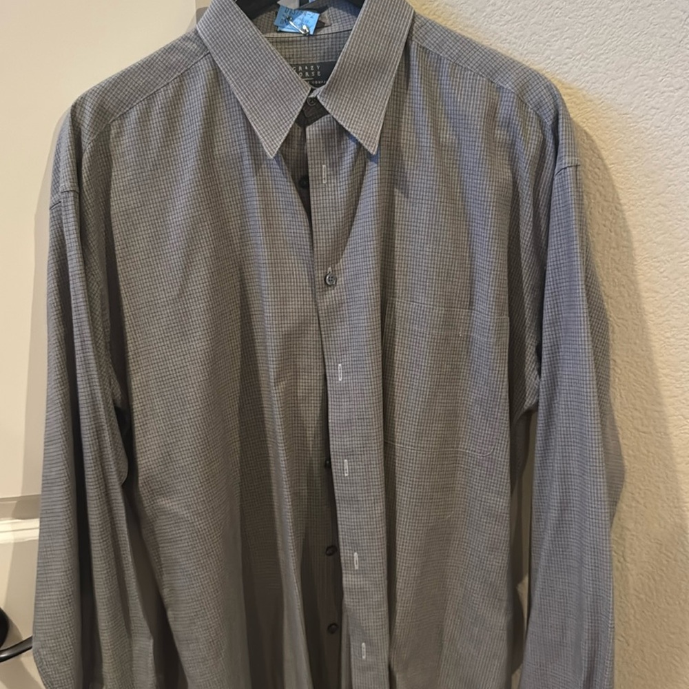 Gray checked button down shirt.